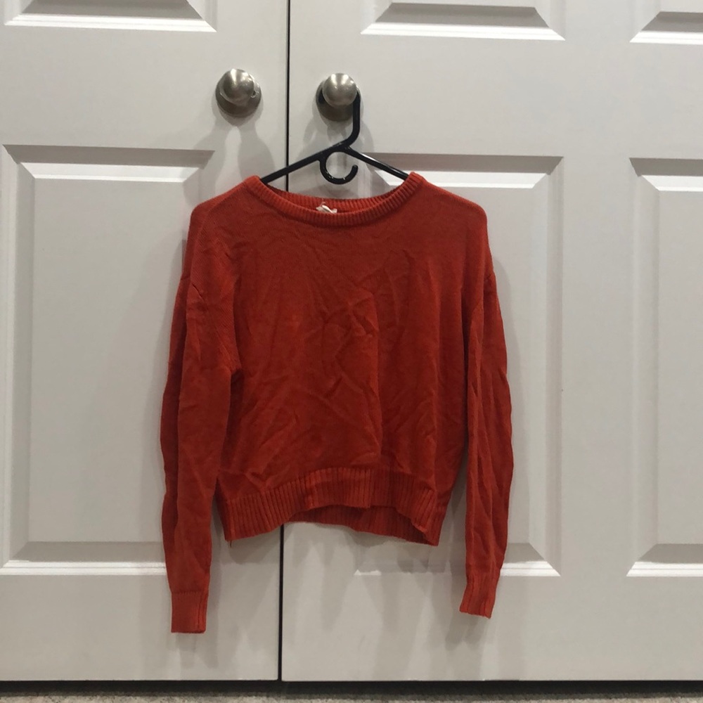Women’s orange sweater